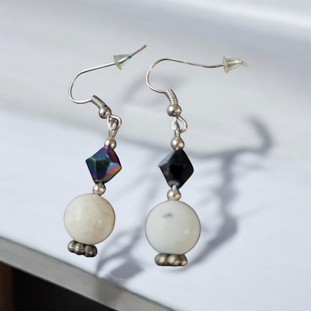 Pair of white and Aurora Borealis earrings